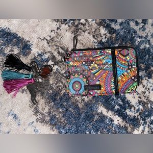 Sakroots card holder key chain. New without tags. Never used Excellent condition